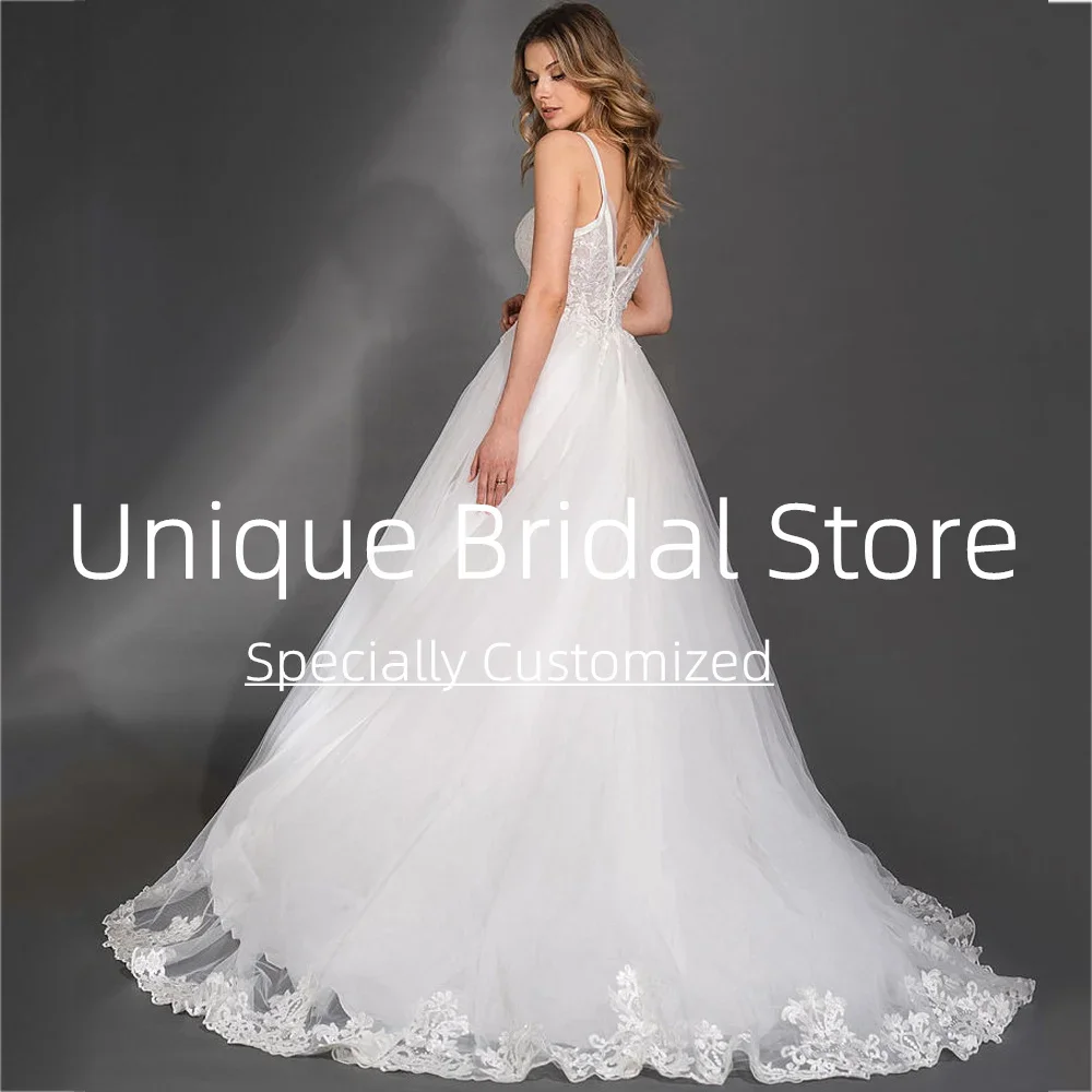 Suknie ślubne na zamówienie, seksowne, eleganckie, w kształcie litery A, z trenem zamiatającym, na ramiączkach spaghetti, bez rękawów, z odkrytymi plecami, urocze aplikacje, suknia ślubna.