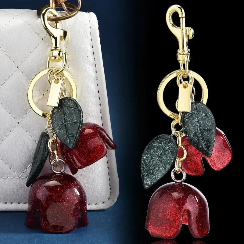 Portachiavi rosa, ciondolo borsa fiore in cristallo, accessorio borsa fiore nappa da donna, ciondolo borsa