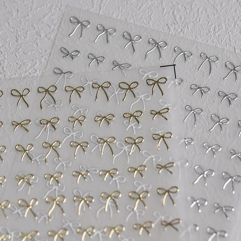 1 Lenzuola Nastro Bowknots Adesivi Per Unghie 3D Carino Arco Punte Del Chiodo Decora Decalcomanie Oro/Argento/Rosa Bowknots Pendenti E Ciondoli Per Unghie Cursori Adesivo