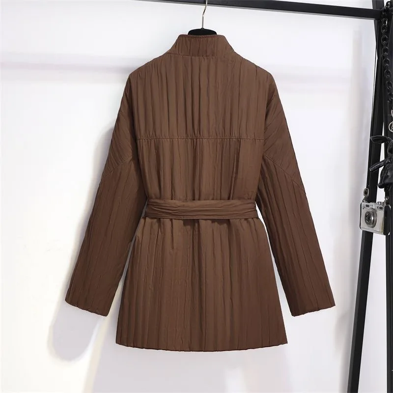 Autunno Inverno La giacca in cotone in vita da donna 2025 Nuova moda allentata pendolarismo vento colore puro tuta sportiva nera femminile
