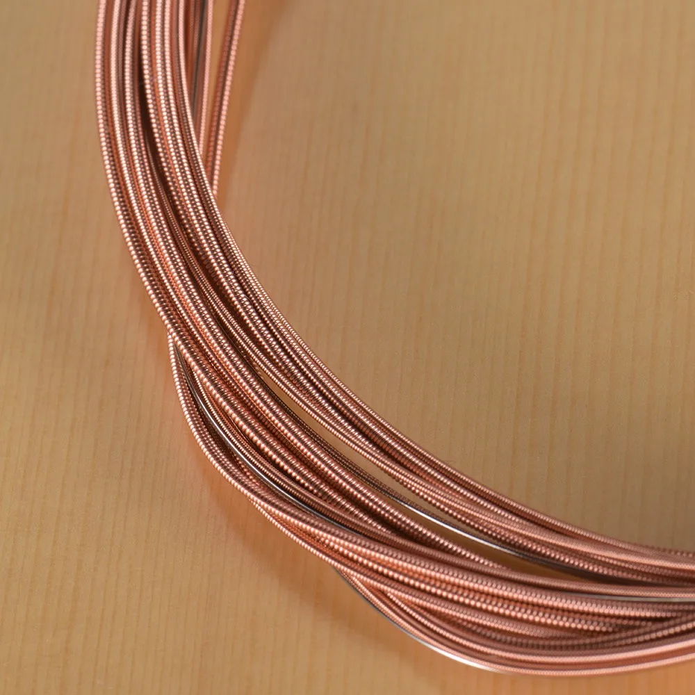 Copper Alloy Folk Guitar Strings Red Copper Color Acoustic Guitar Strings Guitar String Set For Acoustic Guitar Performers