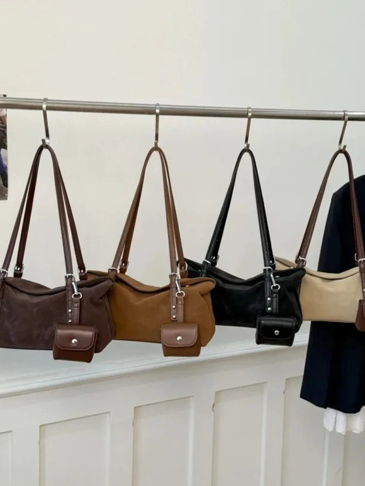 

2025 Fashion Wristlet Bag, Spacious Coin Purse for Women, Niche Shoulder Crossbody, Minimalist Day-to-Night Tote, Textured Sling