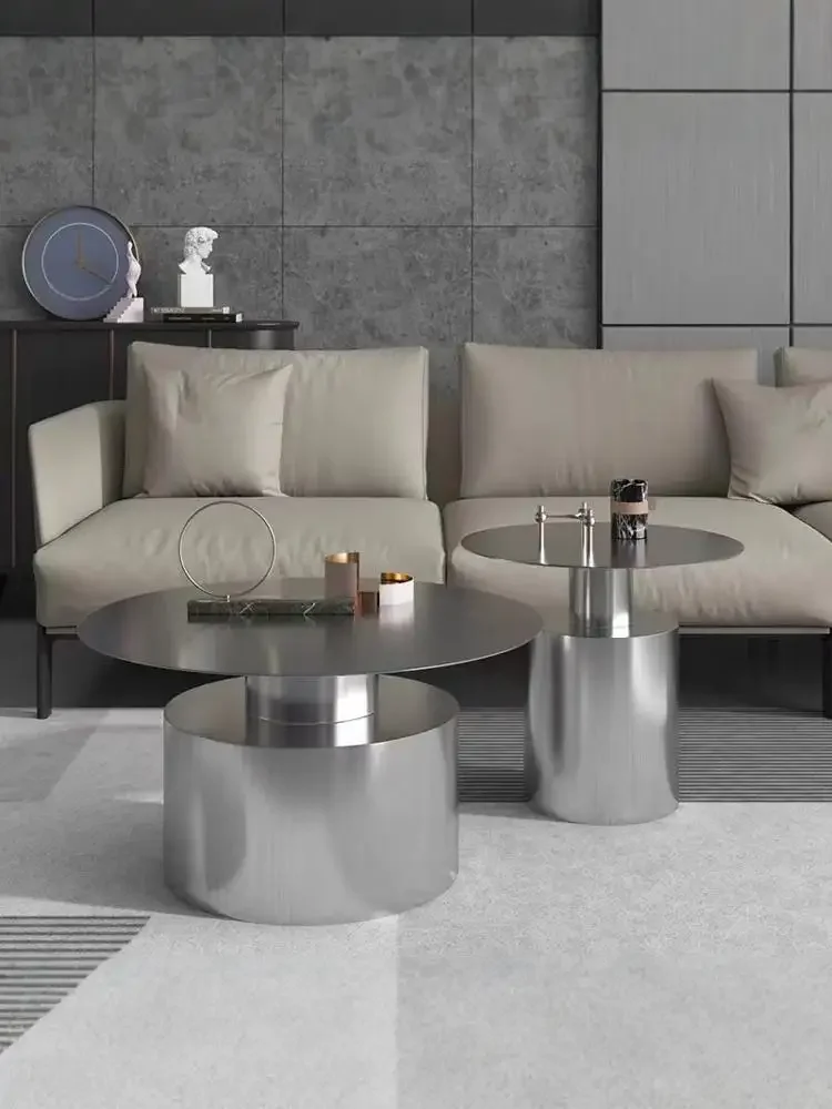 

Light luxury round coffee table combination small apartment living room high and low stainless steel round sofa side