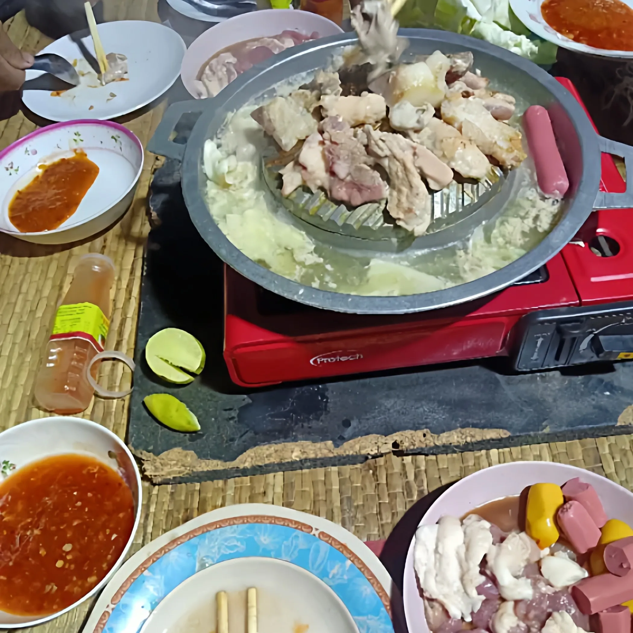 หม้อชาบูปิ้งย่างแบบใช้ถ่าน ลาว - Home Cooking Restaurants บทวิจารณ์และราคา