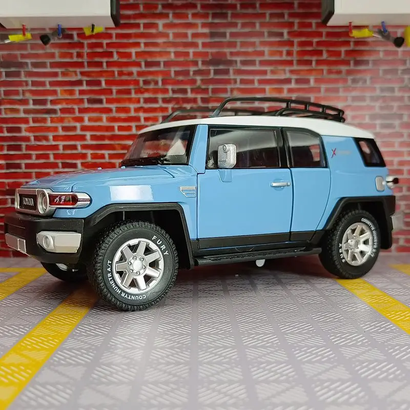 1:24 Toyota FJ modelo de coche de aleación, puertas y capó de motor, el maletero se puede abrir tiene funciones de sonido y iluminación, detalles ricos