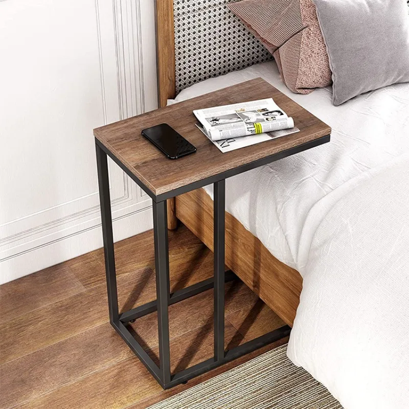 A few corners on the edge of the wrought iron sofa small coffee table, a simple mobile bedside tableC-shaped seam table