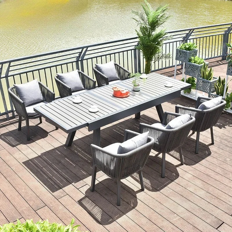 

Wholesale outdoor leisure tables and chairs courtyard stretch table villa garden plastic wood dining table and chairs open-air c