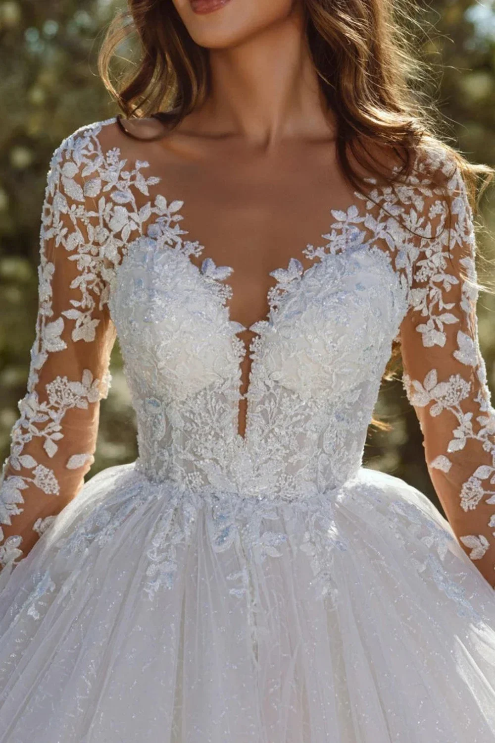 

Modern Shimmering Tulle Wedding Dress — Elegant Ambiance — Long-Sleeve, Deep V-Neck Bridal Gown
