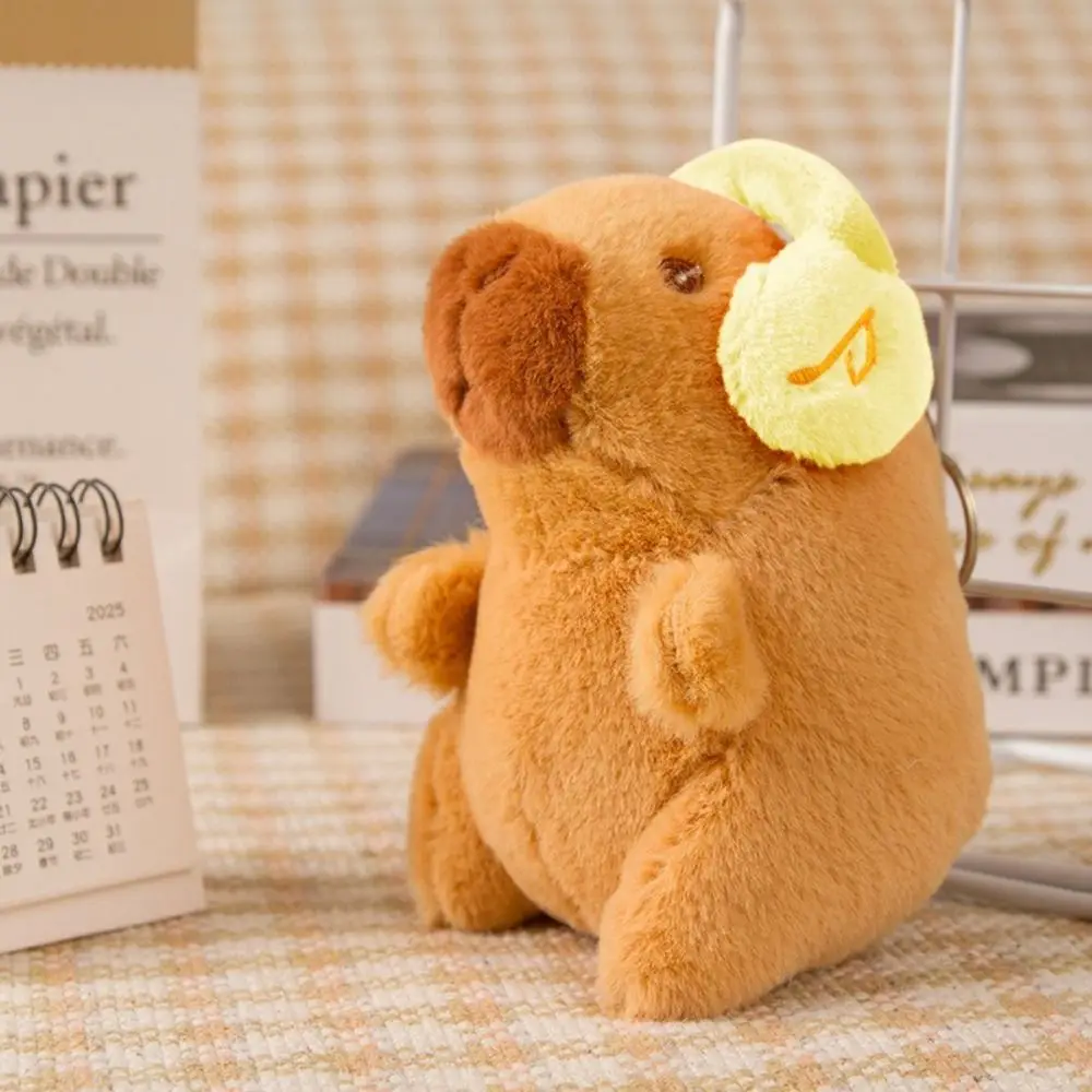 Porte-clés de poupée Capybara en peluche polyvalent, multicolore, portant des écouteurs, pendentif Capybara, sac de jouet