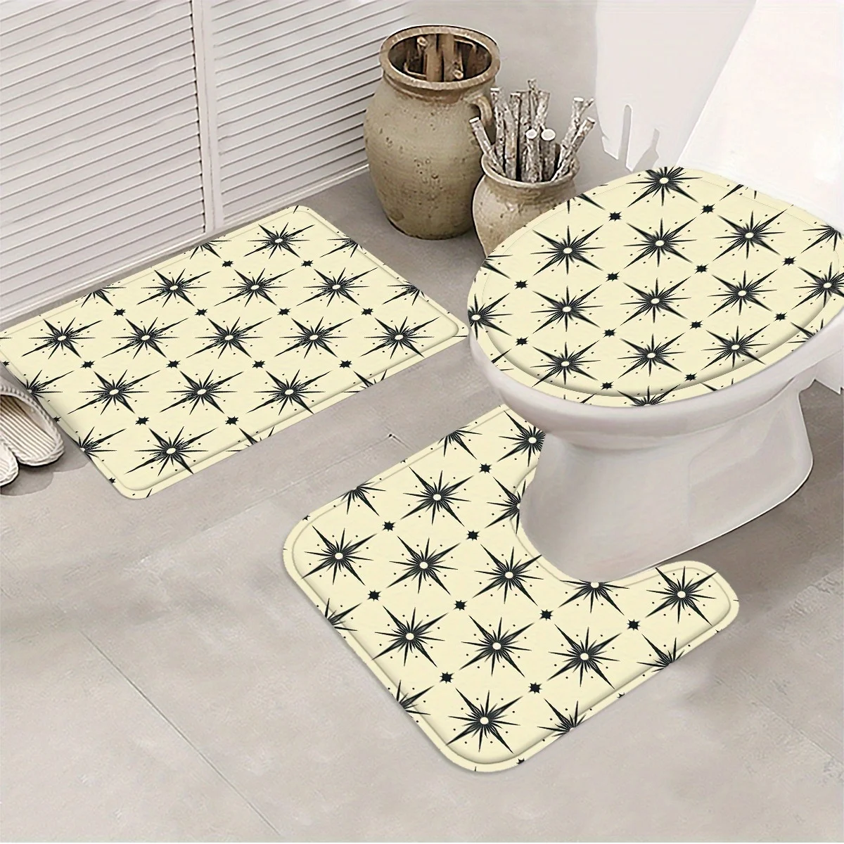 4pc Black star-patterned bathroom set, including shower curtain, non-slip mat, toilet seat cover, and non-slip mat.
