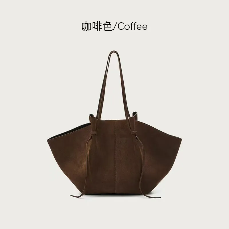 Tas tote baru yang populer tahun ini dengan desain unik, tas wanita simpel berlubang, tekstur untuk aktivitas sehari-hari bagi wanita