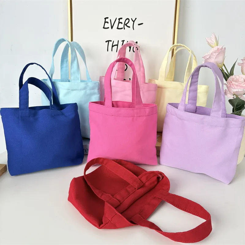 New Solid Color Canvas Handbag for Women, Simple and Portable, Carrying Lunch Boxes and Bento Bags for Work.