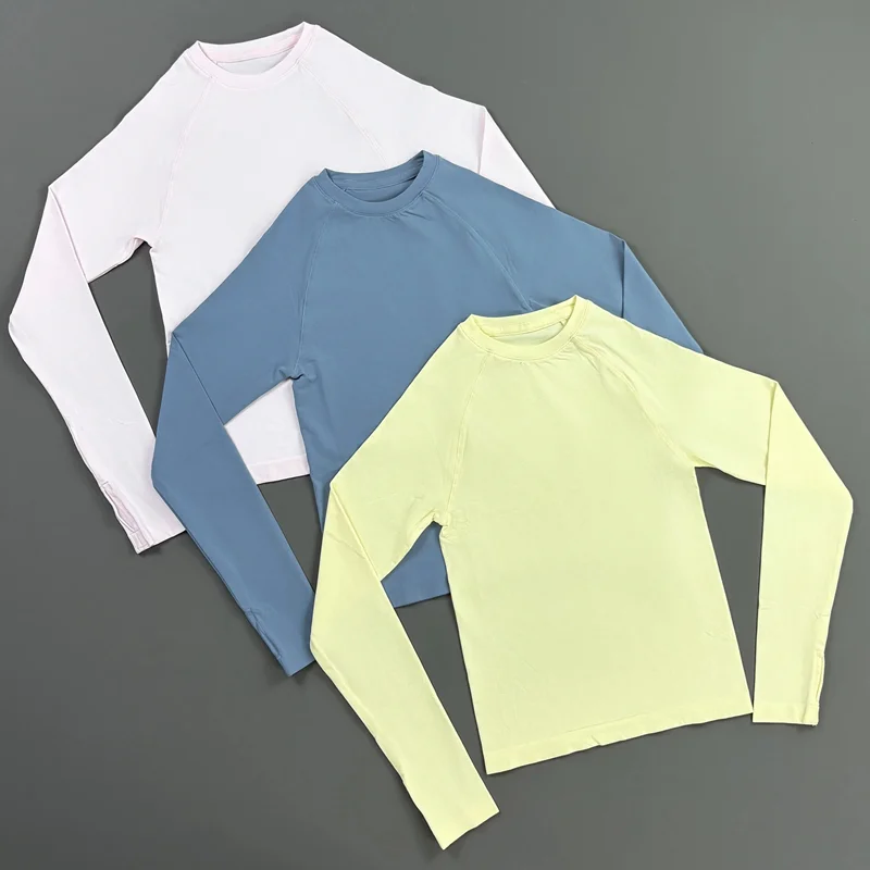 HISTELLO Defy Langarm-Workout-Top für Damen, Nahtloses Gym-Sportshirt mit Daumenlöchern, Slim Fit Sportshirt für Laufen, Yoga und Fitness – Detail 11