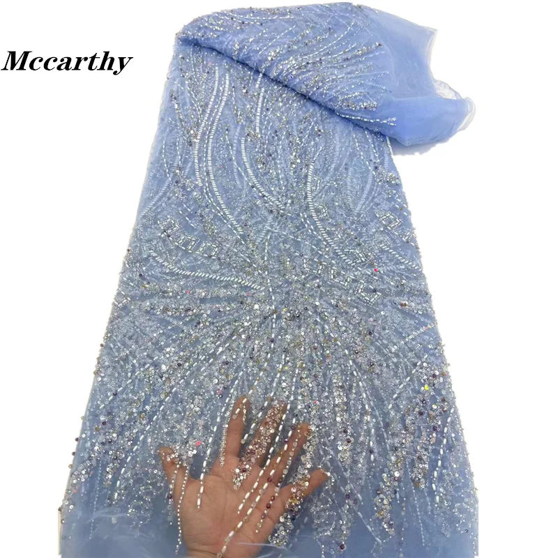 

2023 Luxury Stones French Tulle Net Lace with Sequins and Beads African Nigerian Embroidered Lace Fabric Lace Fabric for Sewing