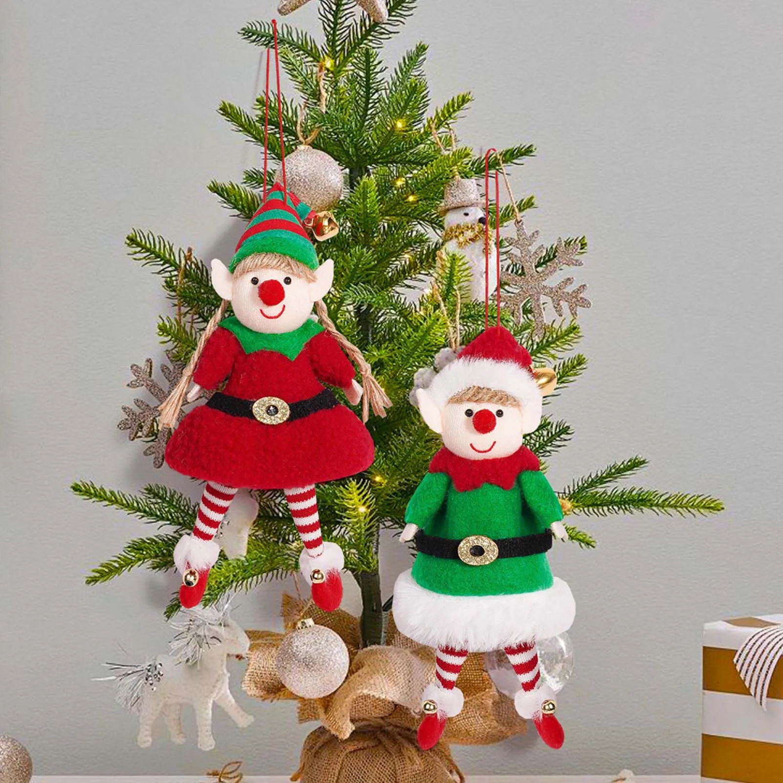 Stuffed Christmas Elf Decorations Dressed In Traditional Red and Green Clothing Design Suitable for Heartwarming Gifts