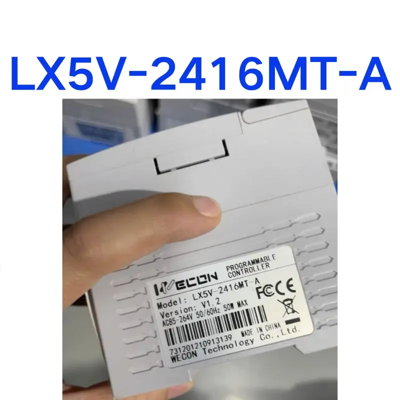 PLC usado LX5V-2416MT-A, teste, entrega rápida