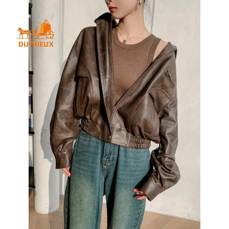 Nieuwe winter dames bruine losse korte leren jas, 100% echte schapenvacht, mode elegante motorfiets leren jas dames