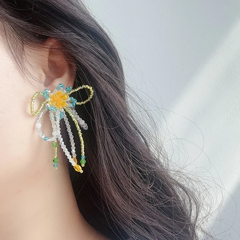 Flower tassel earrings young and energetic Joker atmosphere earrings