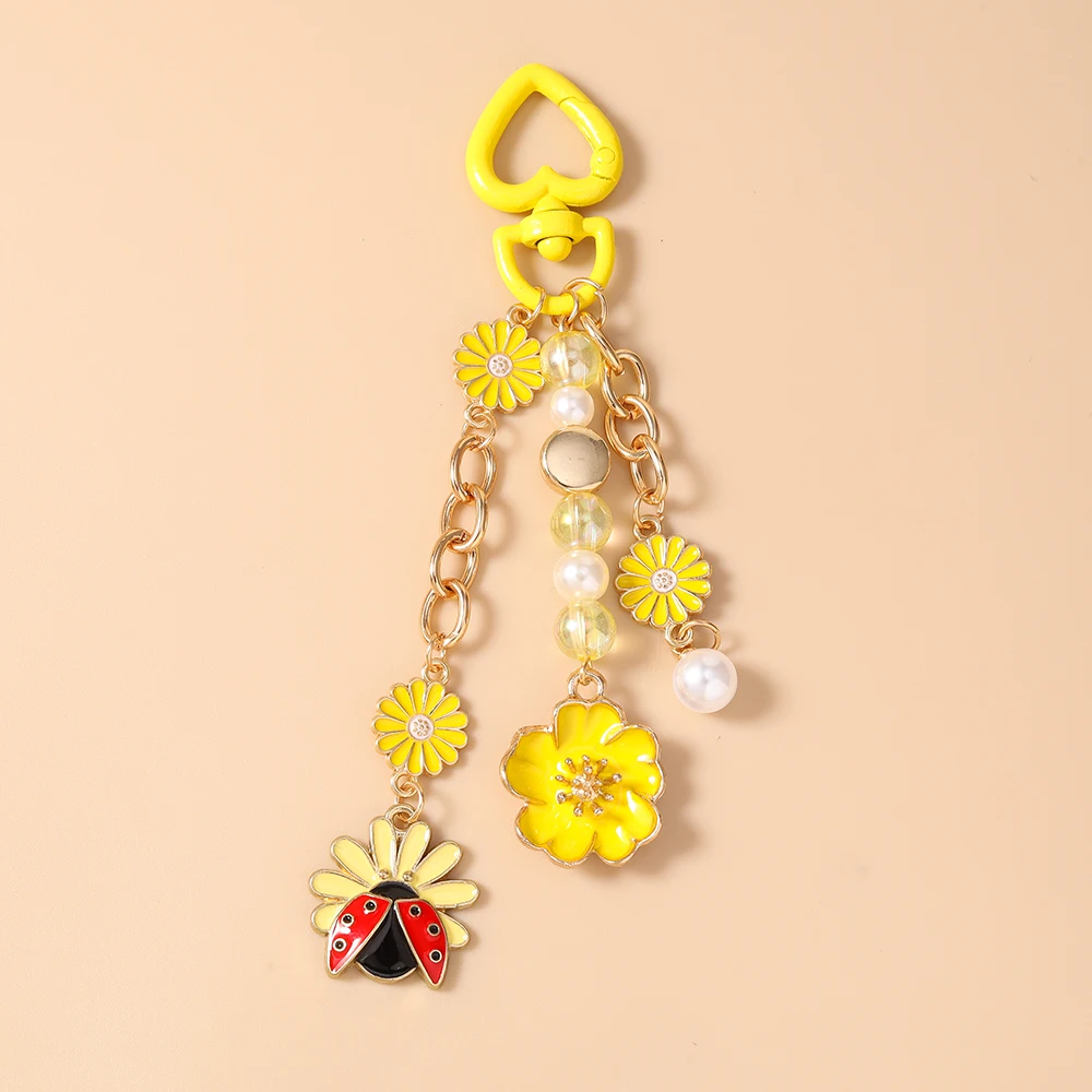 Aihua Schlüsselanhänger Y2K Perlen-Marienkäfer-Gänseblümchen-Schlüsselanhänger für Frauen und Mädchen, Handtaschenanhänger, Schlüsselring, Urlaubs-Schmuckgeschenke – Detail 4