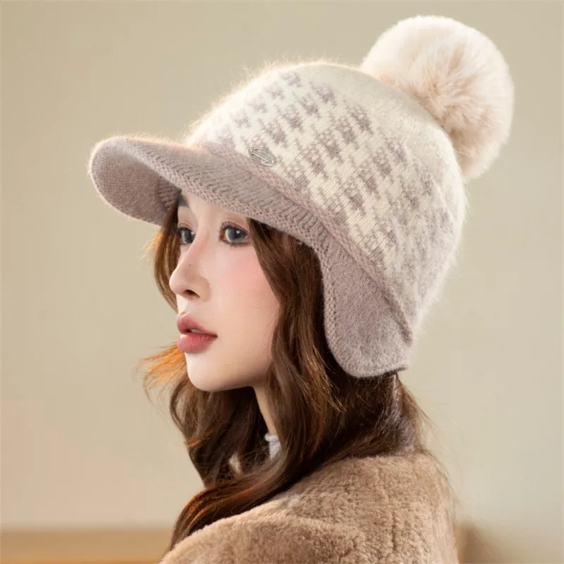 2024 new Korean style women's hat. Fashionable peaked woolen hat with ear protection and pompom. Knitted. Keeps warm in winter.