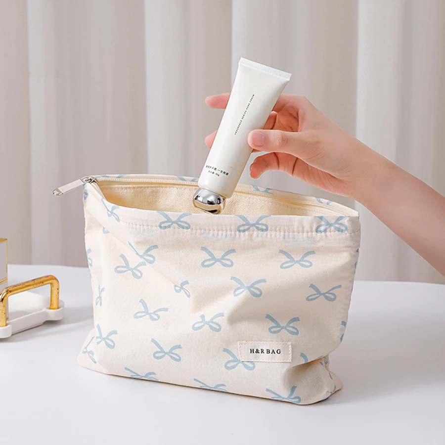 حقيبة مكياج بسحاب مطبوع عليها نمط فيونكة مصممة بشكل بسيط، حقيبة تخزين مستحضرات التجميل خفيفة الوزن ومتعددة الوظائف للنساء