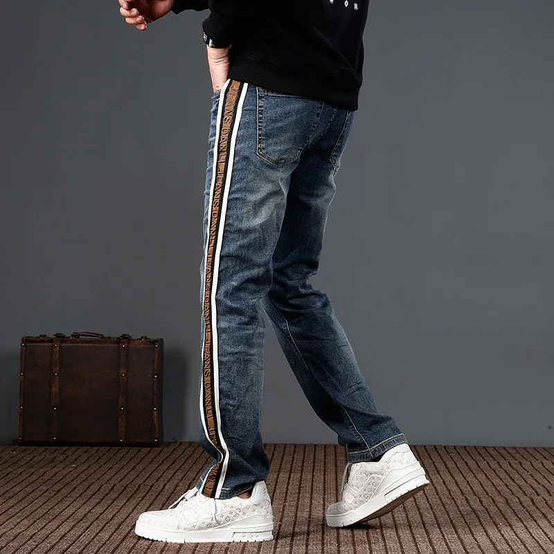 Loose straight tube washed blue denim pants for men's American high street fashion edging striped personalized jeans