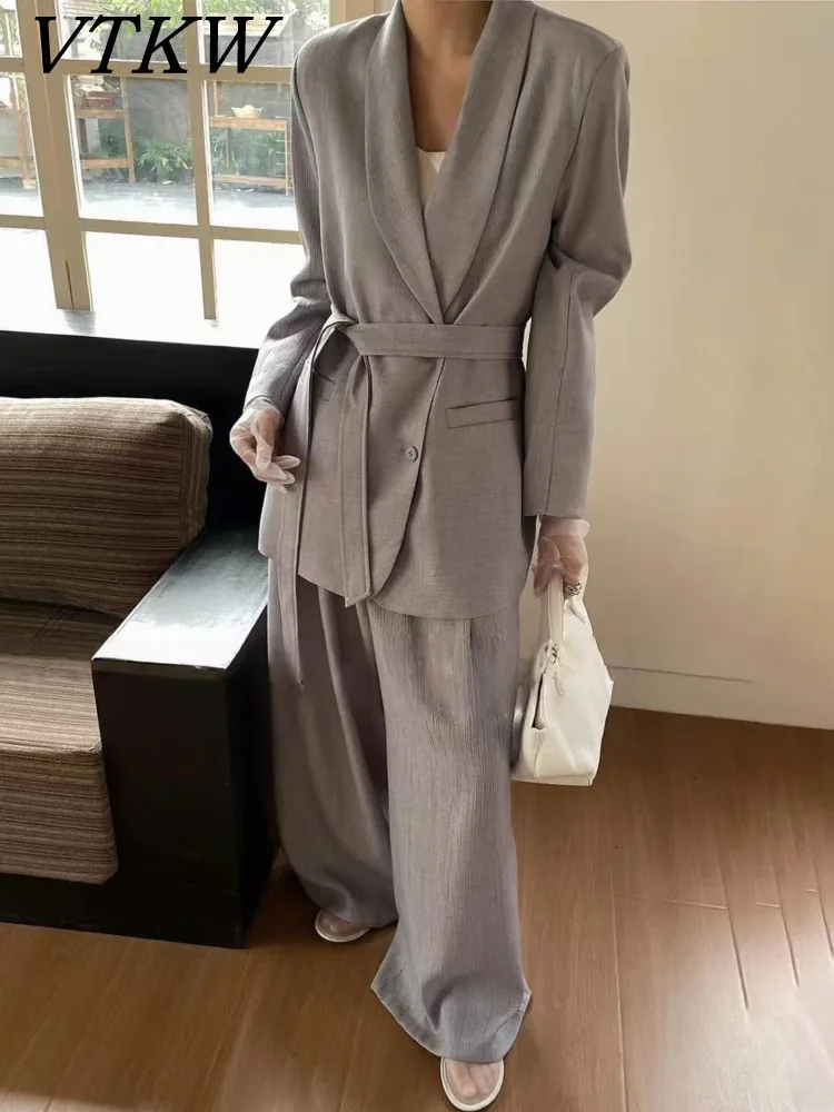 

VTKW 2026 New Women Two Piece Suit Textured Blazer Shawl Collar Self Tie Waist Oversized Wide Leg Trousers Formal Outfit