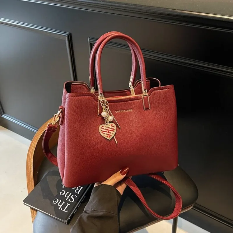 

Модная роскошная минималистичная дизайнерская сумка для подгузников для женщин, элегантная винтажная кожаная сумка большой вместимости, классическая стильная сумка-тоут