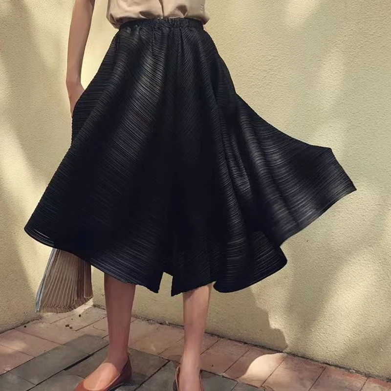 Summer New Solid Color Elastic Waist Wide Leg Trousers Women High Street Pleated Asymmetrical Pockets Patchwork Knee Length Pant