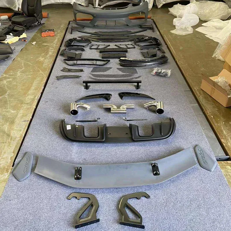 

Factory Wholesale Factory Hot Selling Suitable for 718 Upgraded GT4RS Style Body Kit Rear Diffuser Car Bumper and Spoiler PP Ma