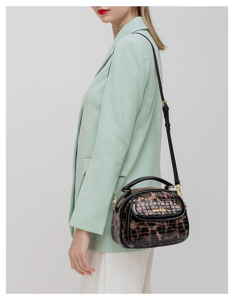 

Chic Animal - Print Handbag: Convertible Strap & Gold Accents