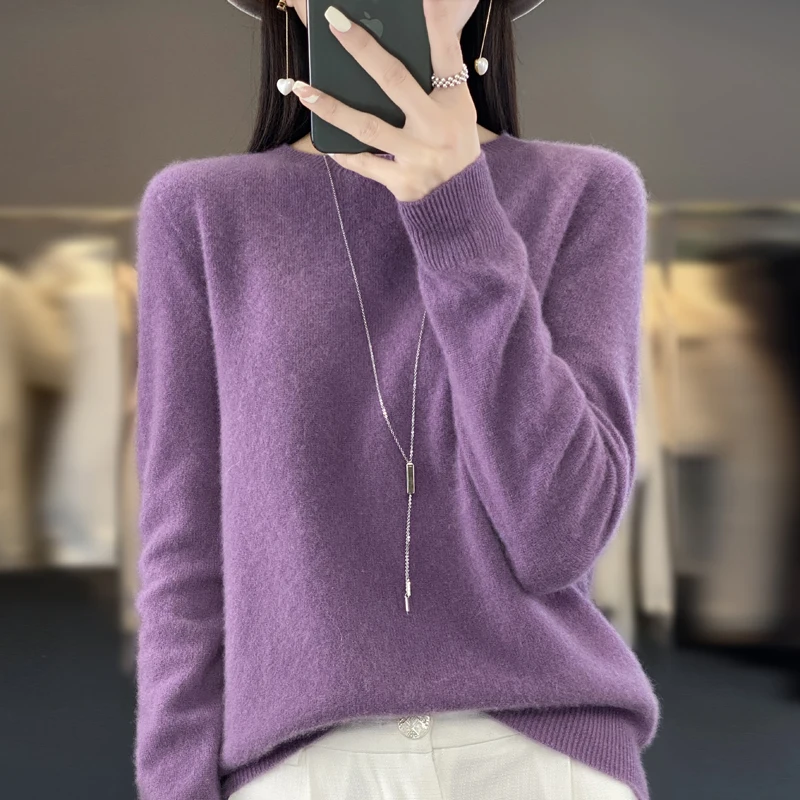 Autumn and winter new Merino 100% wool solid color warm female O-neck knitted long sleeve solid color pullover