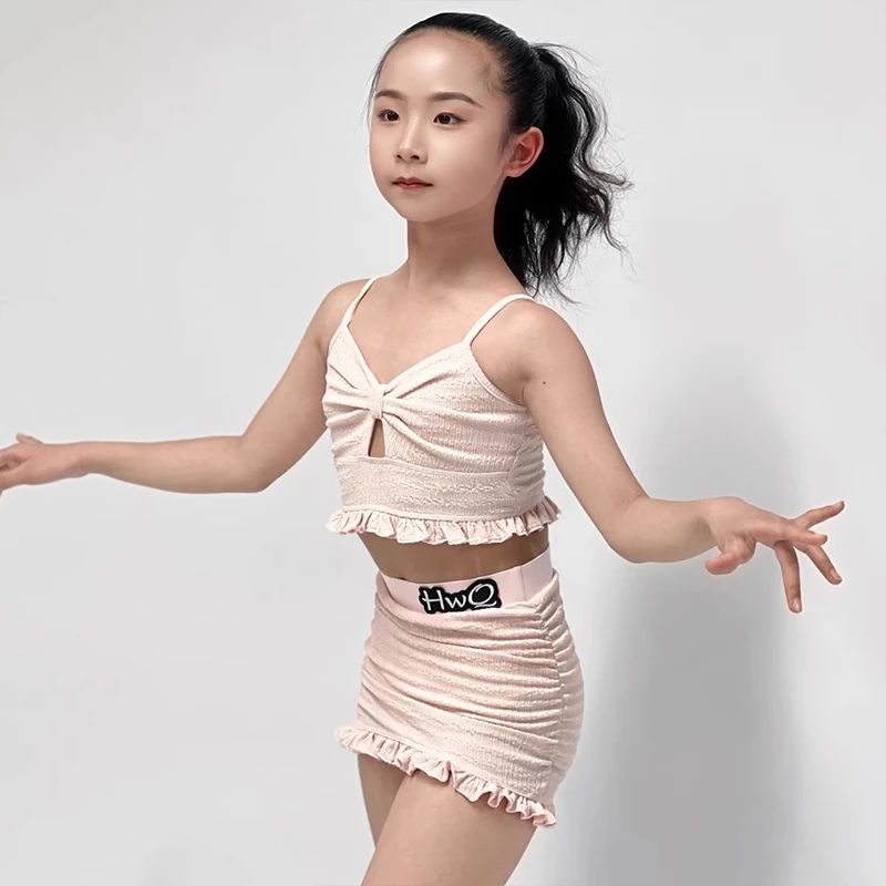 2025 ฤดูร้อนใหม่ชุดเต้นรําละตินเด็กสีชมพูแขนกุดชุดสาว Samba สวมใส่การฝึกอบรมเสื้อผ้า XH2585