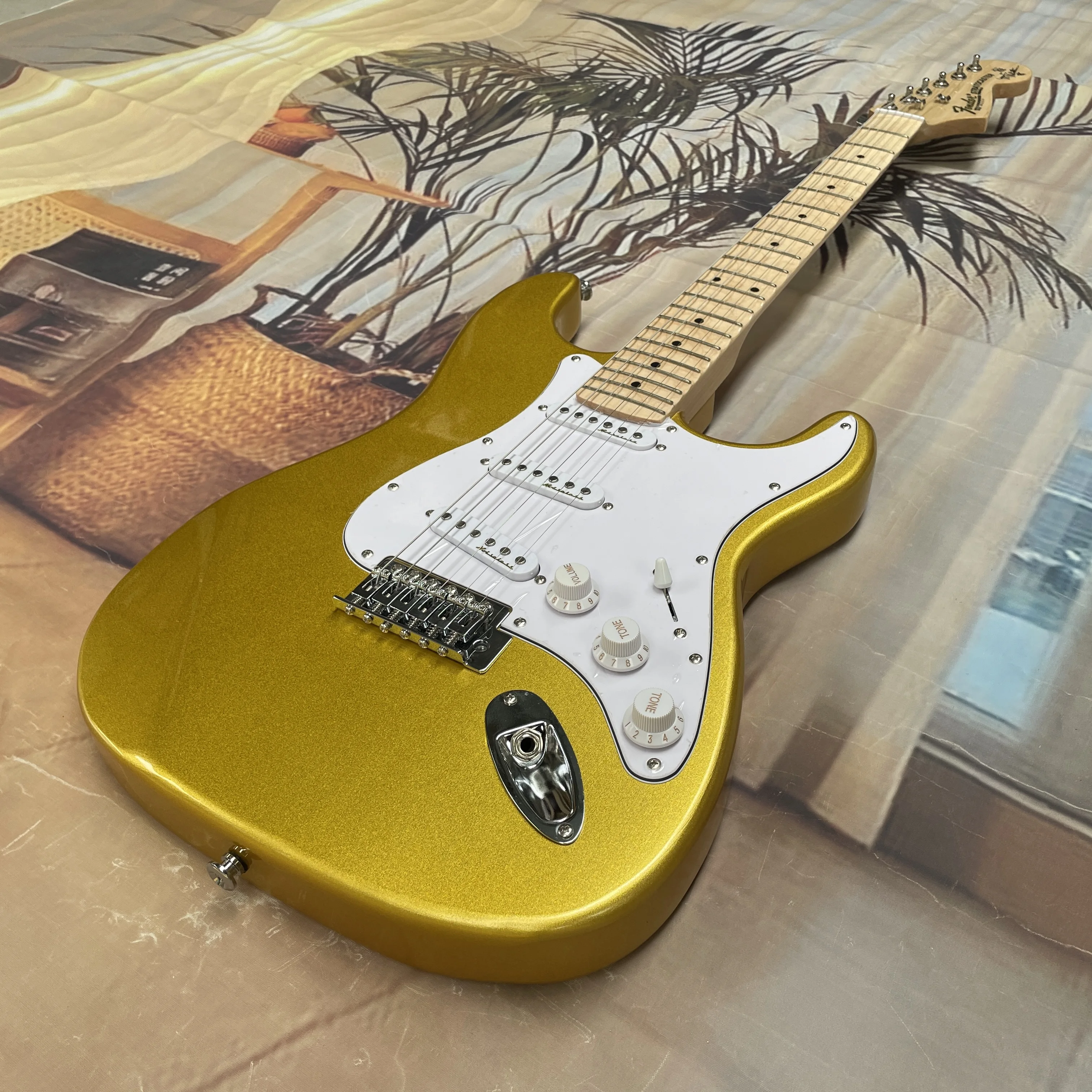 جيتار كهربائي ذهبي اللون بستة  - مراجعة Electric Guitar Beginner وسعره