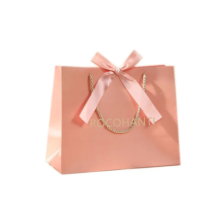 

20pcs Custom Logo Luxury Macaron Cosmetic Packaging Handbag Bag Shopping Paper Bags Pink Gift Clothing Paper Bag With Ribbon Bow