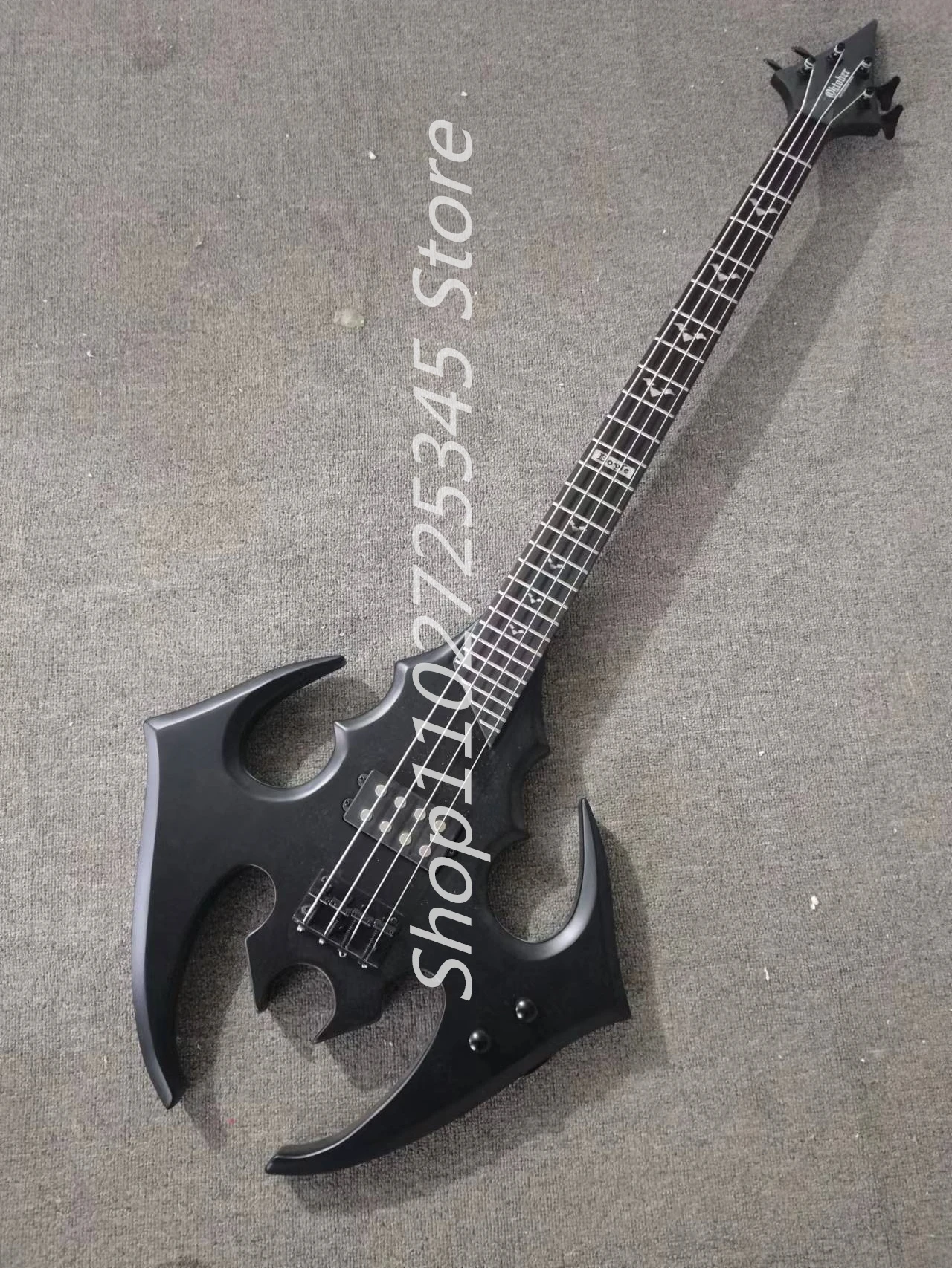 

4 string bass, matte black paint, black accessories, rose wood fingerboard, customizable