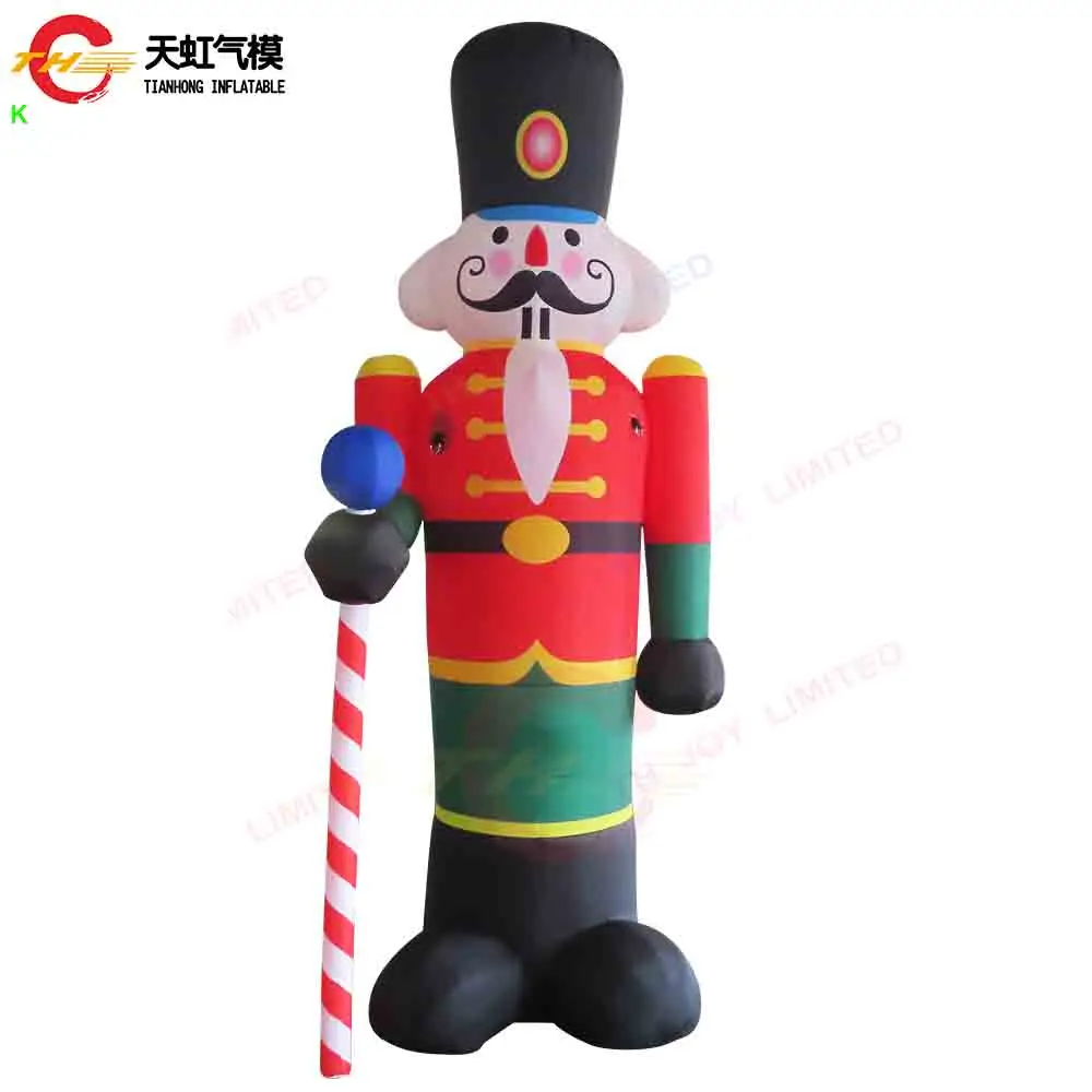 Transporte aéreo rápido soldado inflável dos desenhos animados tema do reino unido modelo de decoração inflável de natal com ventilador