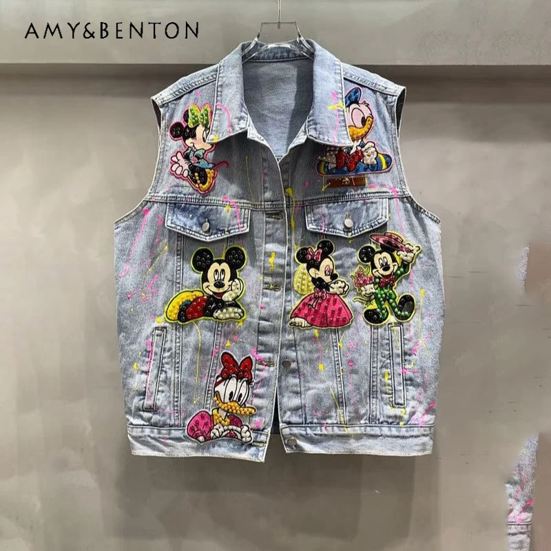 Kamizelka w stylu commuter z koralikami, cekinami i graffiti, kurtka dżinsowa o średniej długości w stylu heavy industry, wiosna-jesień 2026, kamizelka Y2k z motywem kreskówkowym.