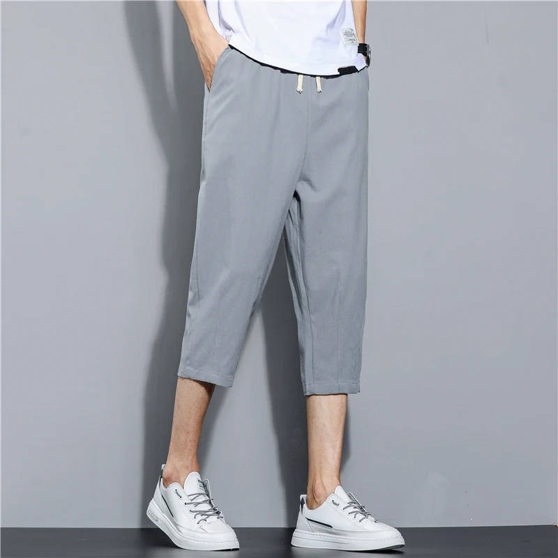 夏薄い綿リネンメンズルーズフィットカジュアルパンツピュアカラー大きいサイズ7フィートの長さファッショナブルなルーズレギンス