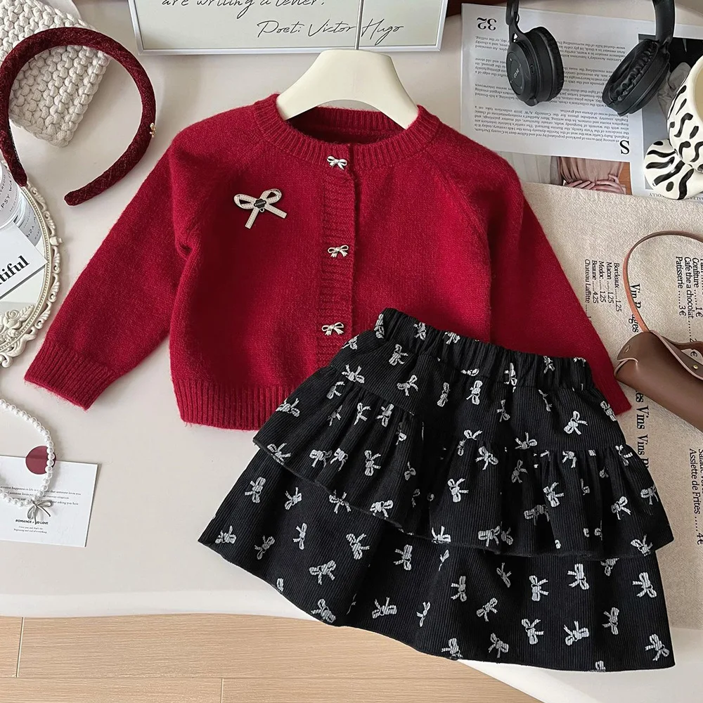 

Autumn Children Girls Knitwear Outfits 2025 Kids Girls Red Sweater Cardigan Suits Loose Bow Printed Cake Skirts 2PCS Clothes Set