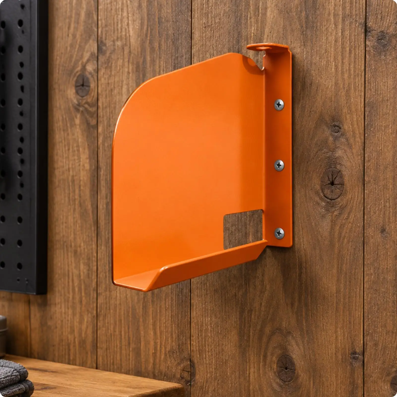 Orange Steel Chainsaw Holder Wall Rack with Shelf Hanger for Tree Trimmer Storage in Garage Workshop