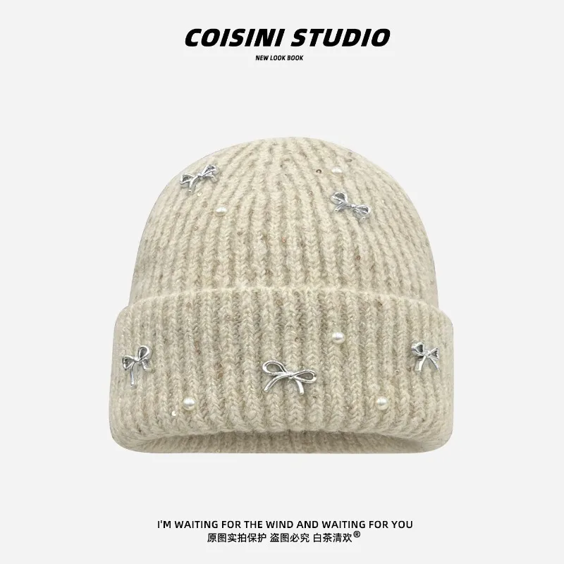 Koreanische Schleifenkappe mit Perlen für Damen, Herbst und Winter, einfache, warme, große Ohrenschutz-Strickmütze. – Detail 6