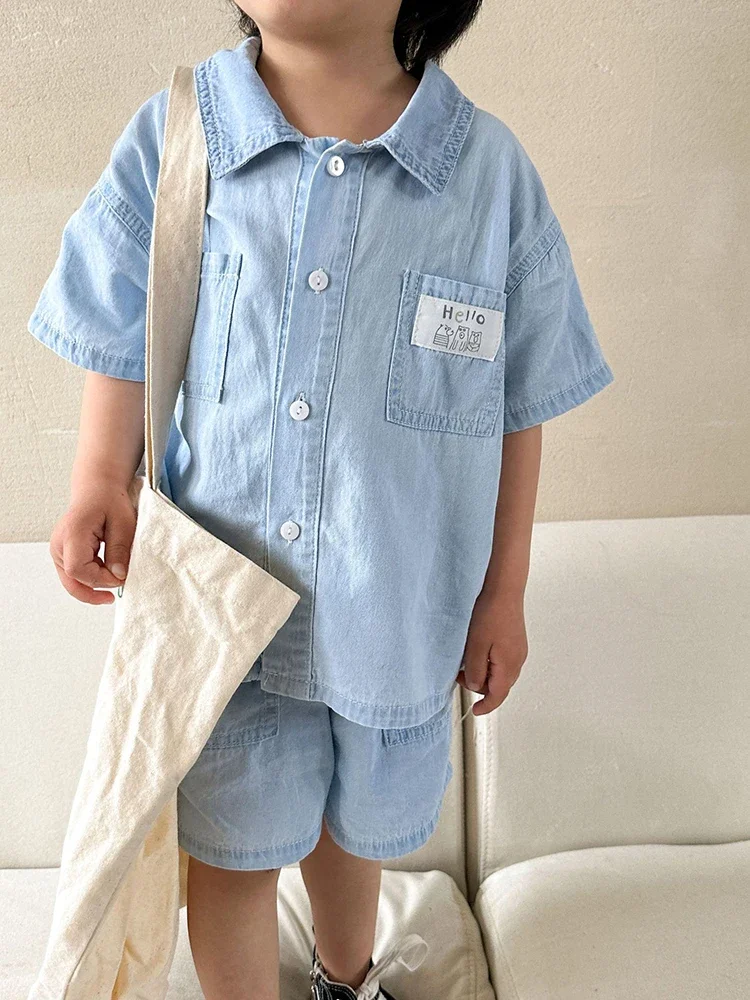 Cute Children\'s Denim Suit 2024 Summer Korean Fashion Loose Short Sleeves Tops Shorts 2pcs Toddler Cotton Tees Suit Solid Color