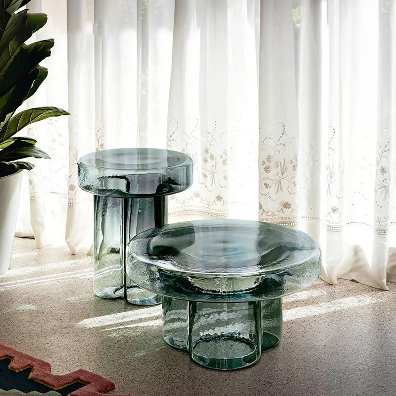 Modern design art round coffee table is fully equipped with amber petal glass edges of Nordic simple small apartment