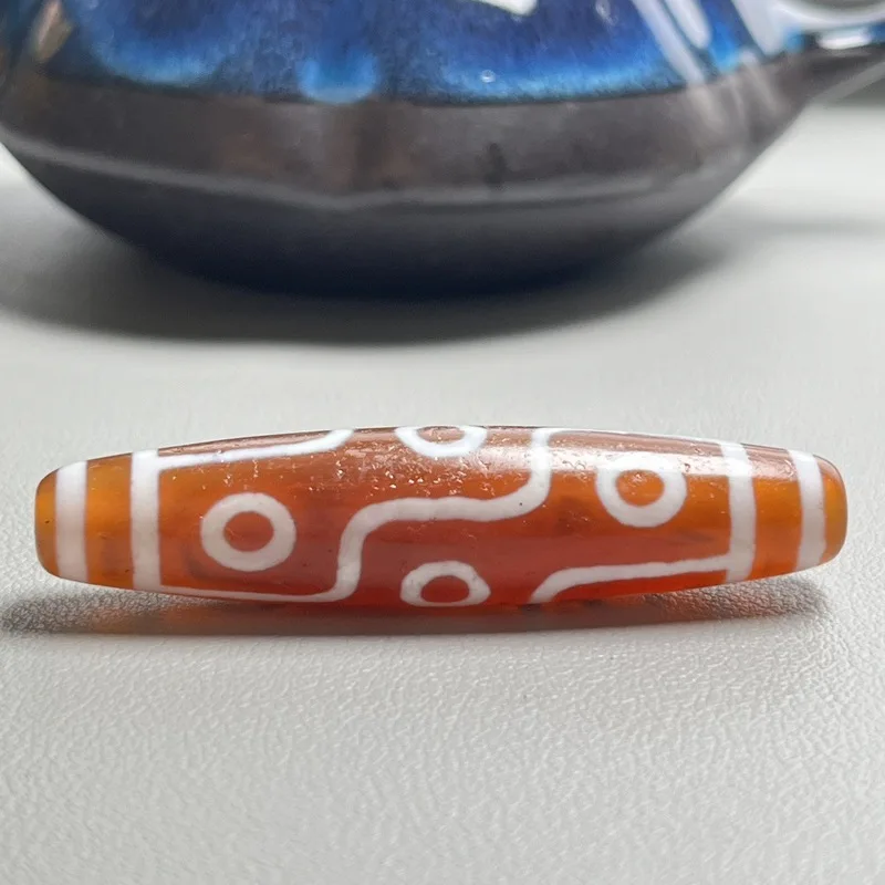 Agate Tibetan-Style Ethnic Pendant With A Patina, Featuring A Red Nine-Eye Dzi Bead, A Necklace Or Clavicle Chain