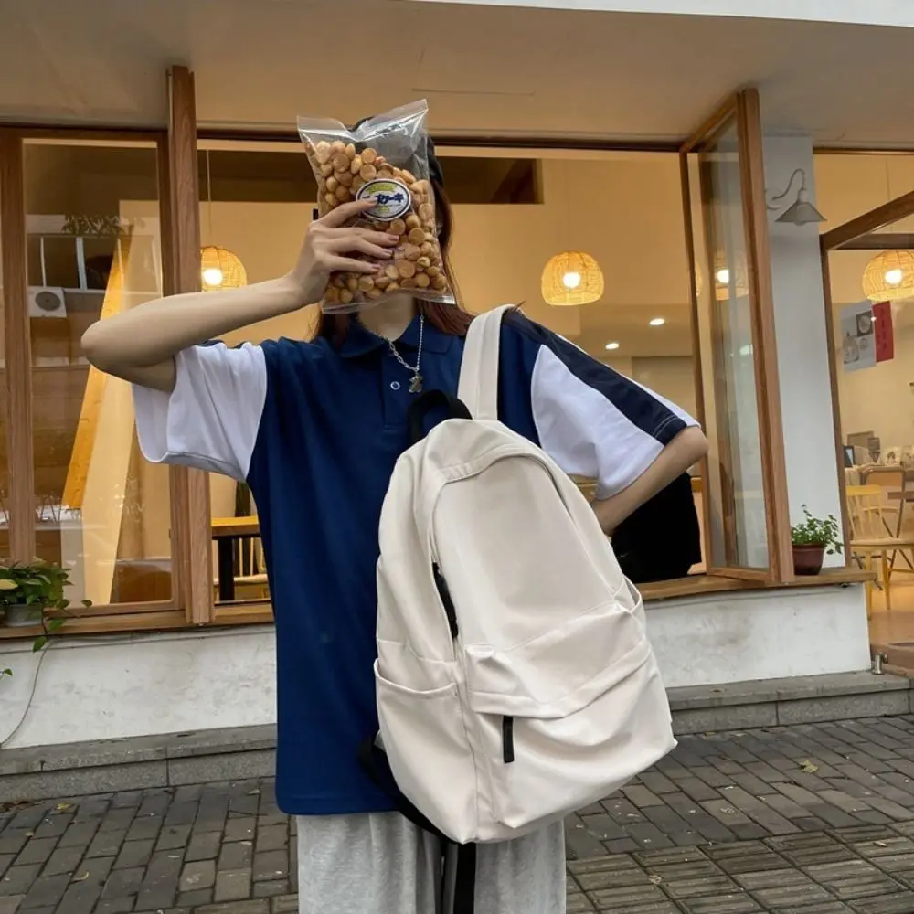 กระเป๋าเป้สะพายหลังอเนกประสงค์สีดำสีเทาสีขาวสีแดงคุณภาพสูงกระเป๋าคอมพิวเตอร์กันน้ำไนลอนซักได้กระเป๋าเดินทางความจุขนาดใหญ่ใช้ได้ทุกเพศ