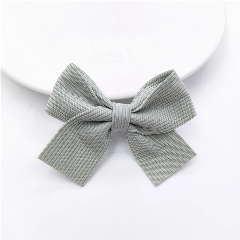 20 sztuk 7*5.5CM tkaniny Bowknot aplikacja dla DIY dziecięca spinka do włosów kapelusz nakrycia głowy rzemiosło łatki ozdoba dekoracyjna odzież