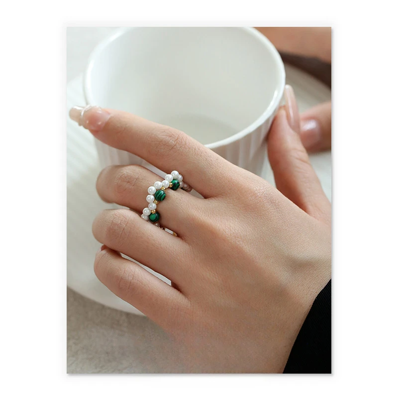 

European and American niche fashion sense light luxury imitation pearl natural stone winding ring jewelry women