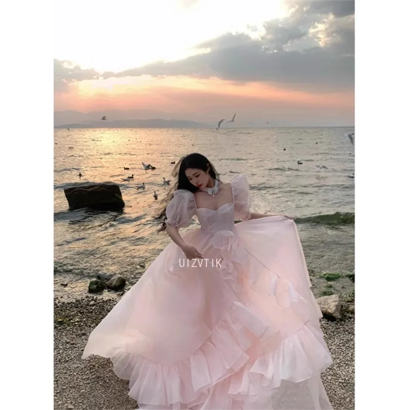 ピンクのウェディングドレスショートパフスリーブフリル写真撮影ドレスカスタマイズされたプリンセスフォーマル女性プロムイブニングパーティードレス