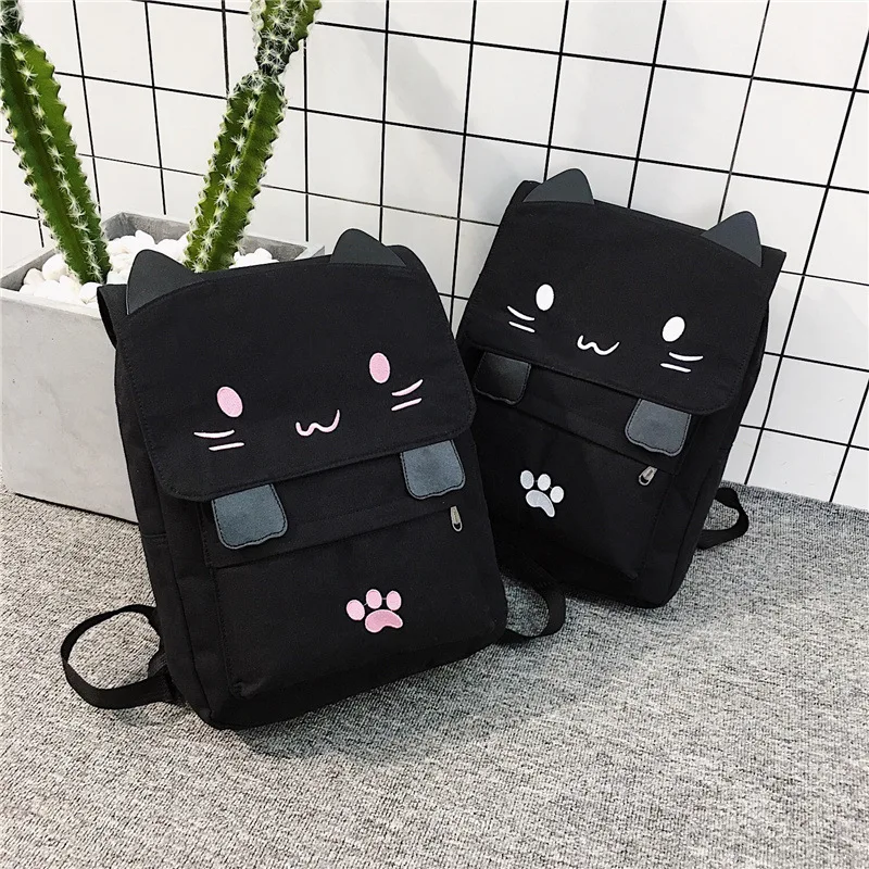 2025 gato saco de escola bonito bordado lona mochila dos desenhos animados gatinho pata mochila para crianças presente natal para a menina